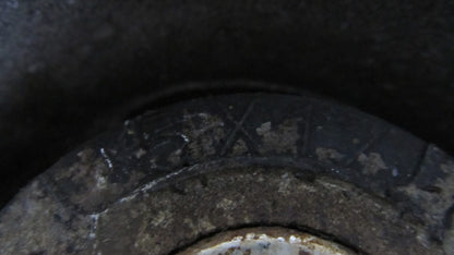 7754037